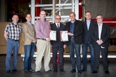 Proud management team receiving the certificate from Bureau Veritas Certification. From left: Torben Bech, CTO Søren Find Madsen, CPO Thomas Holm Krogh, Aerospace Auditor Tom Christensen, CEO Kim Bertelsen, CFO Jens Kristensen, CSO Michael Ariel Nielsen. Photo: Jimmi Kallesøe.