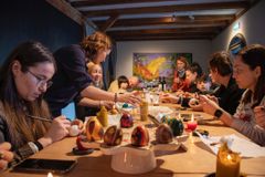 Workshop of beeswax painting Easter eggs. Photo by Vian Backer Shaker