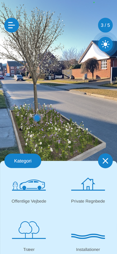 I appen kan man også forsøge sig som byplanlægger ved at placere vejbede og -træer.