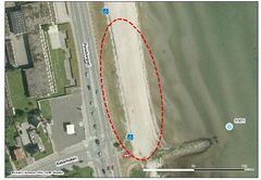 På Sønderstrand Syd frarådes der badning. Målingen er foretaget i den blå cirkel. Foto: Aabenraa Kommune