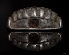 Sølvsmykke fra vikingetiden. Foto: Flemming Fabriciussen
