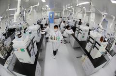 Drug inspectors test Favipiravir tablets at the Quality Control Centre of Zhejiang Hisun Pharmaceutical Co., Ltd.?