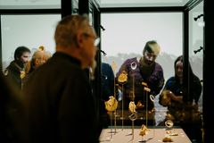 The many gold pieces from The Vindelev hoard, which includes the bracteate with the Odin inscription, is exhibited at the National Museum of Denmark. Photo: Joakim Züger, The National Museum of Denmark.