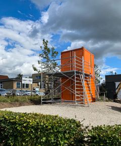 Fire steder i området omkring Jomfrustien er der sat orange containere op, der de kommende år kan rumme midlertidige aktiviter. Foto: Haderslev Kommune