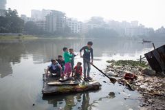 Children are having fun on a raft, after winning their cricket match, on the polluted Banani Lake in the Korail Slum of Dhaka, Bangladesh, on 28 January 2024. Unfortunately, the lake is polluted with garbage. In addition, improper waste management and the presence of human waste in the lake that people live around are causing children to fall sick, have skin diseases, miss school and not have the chance to live up to their full potential. Safe sanitation is a critical need in the area. And to achieve this, UNICEF Bangladesh is launching a new sanitation project in partnership with the government - an innovative, climate-resilient solution for treating and reusing wastewater.