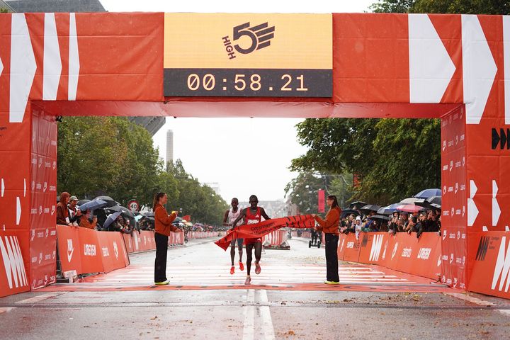 Nicholas Kipkorir claimed a dramatic victory in the men’s race, clocking 58:23 after recovering from a crash on the wet streets of Copenhagen.