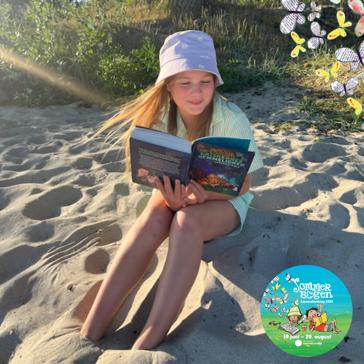 Billede%20af%20pige%20der%20l%E6ser%20p%E5%20stranden