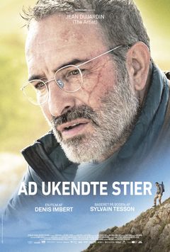 Den danske filmplakat for Ad ukendte stier