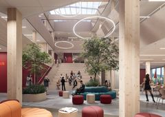 Det centrale atrium bliver husets hjerte. Her er fokuseret på overflader i træ og farver holdt i varme nuancer.