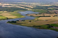 Landbrug & Fødevarer og dansk landbrug vil gøre alt, hvad vi kan, for at reduktionsmålene nås. Implementering af aftalen i den grønne trepart er afgørende i den proces, siger Anders Panum Jensen.