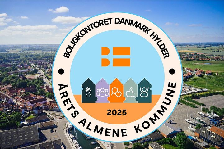 Logo med Årets Almene Kommune.