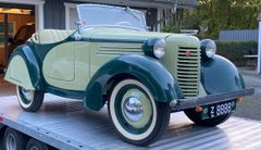 Austin Bantam, 1938 som frontløber, da modellen angiveligt inspirerede Anders Ands ikoniske bil, plus de militære Jeep køretøjer var baserede militære på Bantam-chassis