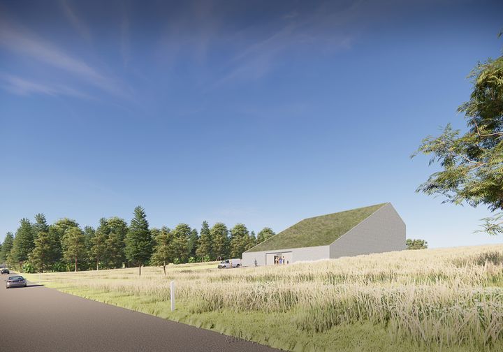 Illustration af det kommende vandværk ved Bunkedal Mølle. Området omkring vandværket vil blive beplantet, så det fremstår som et grønt område.