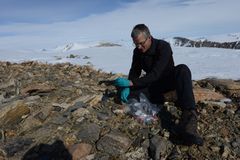 Researchers collected samples from some of Greenland’s most remote areas. Here, Professor Bo Elberling is taking soil samples on a nunatak; a mountainous area surrounded by the Greenland ice sheet. Here, too, the researchers were able to observe an uptake of methane similar to what was measured in dry areas elsewhere in Greenland. Photo: Elise Biersma