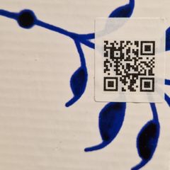 The fingerprint consists of a mark measuring one millimetre square, which is sprayed onto either the product itself or its packaging using transparent ink. The ink contains various microparticles that form a random pattern that could never be recreated. The mark is embedded in a tiny area, is scannable with a standard smartphone, and serves as legally recognised proof of authenticity.