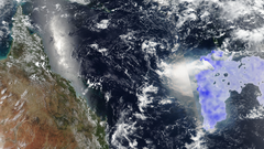 Satellite image using the VIIRS satellite on 16 January 2022, 13:30 UTC, showing in blue the cloud of formaldehyde measured by TROPOMI. To the left is the Australian coast of Queensland. Source: van Herpen et al. (2026)