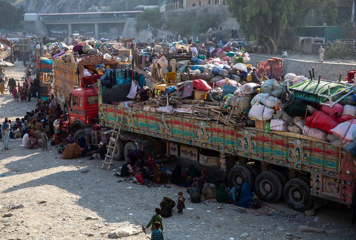 Loaded trucks in Torkham as thousands of Afghan returnees make their way back to Afghanistan from Pakistan.