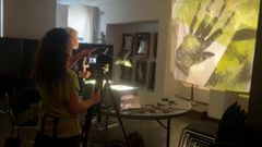 Claudia Reed med kunstnere og frivillige - unge og gamle - på en opvamende work-shop hos Tivoli.