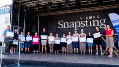 Repræsentanter fra alle 15 deltagerbyer i Lokaldysten 2026