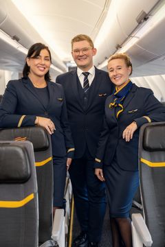 Alexander Brund med hans to kolleger i et Sunclass Airlines fly
