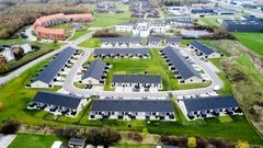 De 458 ejendomme, som tilsammen udgør 44.500 kvm, ligger i Odense, Vejle, Kolding, Fredericia, Odder og Middelfart kommuner. På billedet ses Thygesminde Alle i Fredericia.