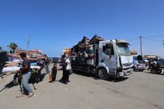People flee south from Gaza city following continuous shelling during the first half of September.