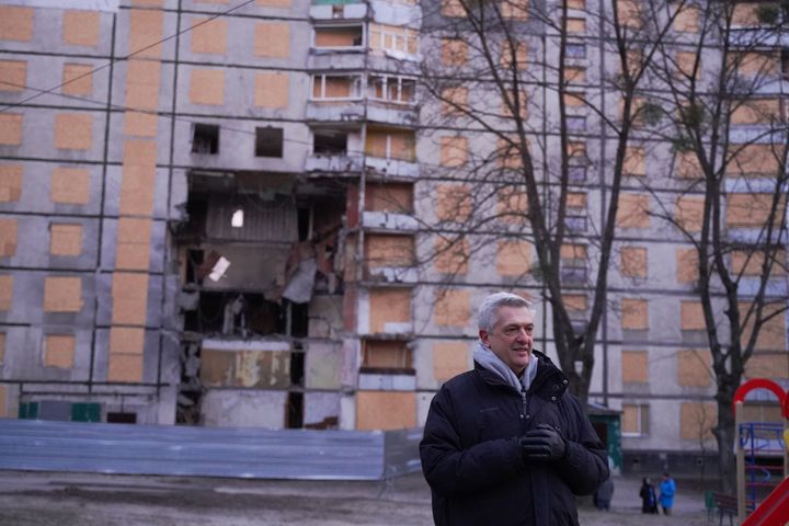 UN High Commissioner for Refugees Filippo Grandi visits an attack site in residential area in Kharkiv.