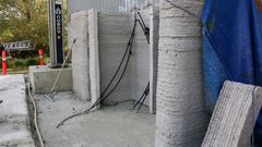 3D-printed concrete walls. Rumett’s the goal is to make these with a gypsum blend.