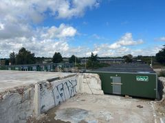 Ved Bjørnholms Alle er nedrivningen af den gamle papirfabrik udført, og arbejdspladserne her er allerede taget i brug.