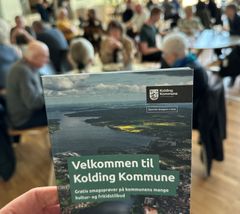 Folder med teksten "Velkommen til Kolding Kommune"