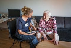 Nurse talking to a citizen
