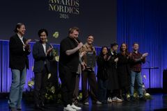 Rasmus Munk og holdet fra Alchemist på scenen for at modtage 'Restaurant of the Year'.